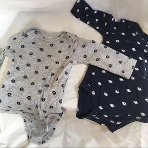 Carter’s 2 long sleeved onesies.